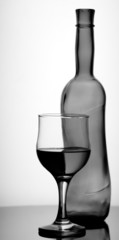 wineglass and bottle on the desk. kitchen still-life