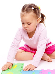 Little girl with alphabet