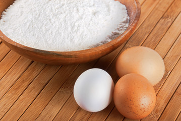 Flour with raw eggs for making dough