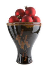 ceramic vase with red christmas balls