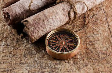 Old compass on grunge background