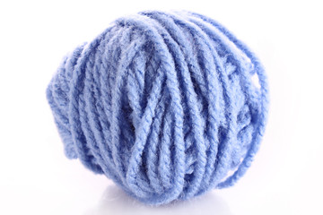 Blue ball of woollen red thread isolated on white