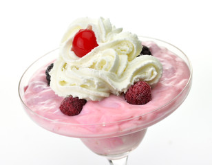 fresh Yogurt dessert with berries and cream