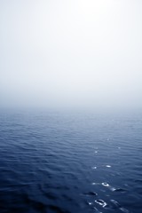 Blue fog sea in a foggy day with low ocean visibility