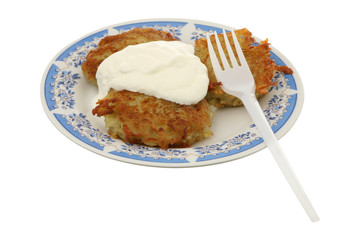 Potato fritters with sour cream
