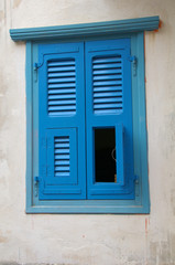 Unusual blue window shutters © avorym