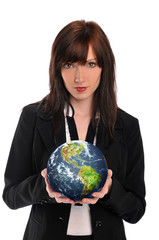 Young businesswoman holding the earth