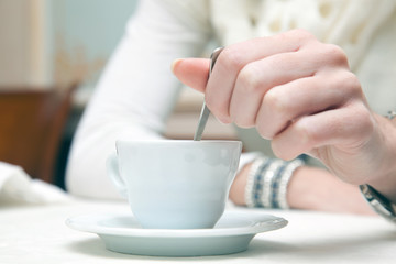 Woman taking a break with a cup of coffee
