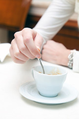 Woman taking a break with a cup of coffee