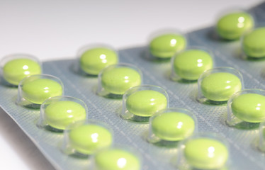 box of green pills