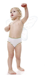 Girl infant with wing turns round