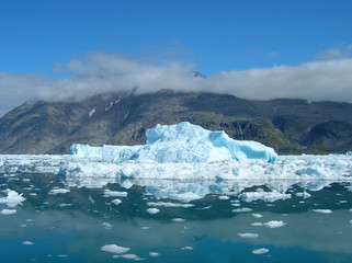 Melting icebergs by the coast of Greenland,