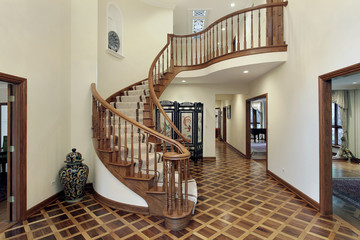 Large foyer with circular staircase