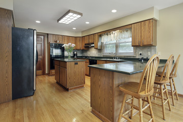 Kitchen with wood cabinetry