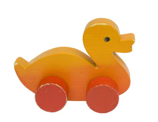 Old wooden toy duck on white background