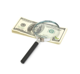 Magnifying glass on money