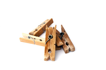 pile of wooden clothespins isolated on white