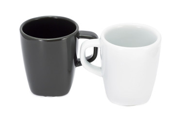 Black and white espresso cups on white background