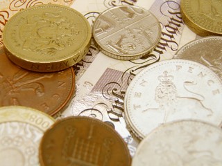 British Sterling pound currency banknotes and coins