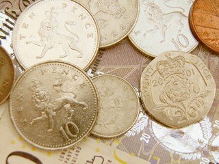 British Sterling pound currency banknotes and coins