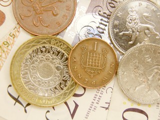 British Sterling pound currency banknotes and coins