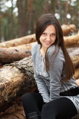 Young woman outdoors in forest