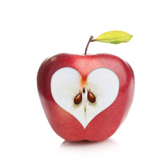 Perfect fresh red apple with a heart shaped cut-out on white