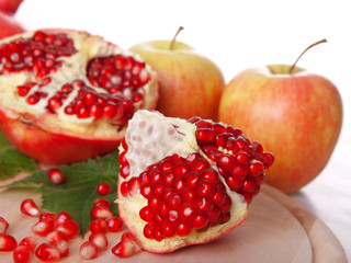 Pomegranate fruit, isolated on white background