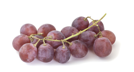 Obraz premium Red grapes isolated on white background