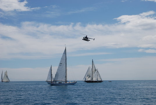 sailing regatta and helicopter