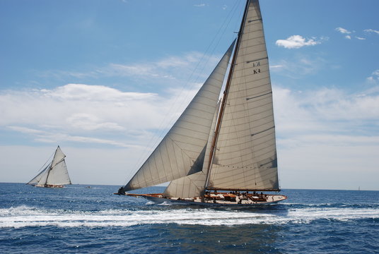 Classic wood Yacht under full sail