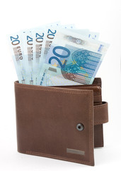 brown wallet with euros