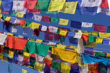 colorful tibetan prayer flags in Nepal