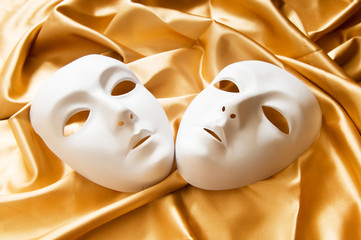 Theatre concept with the white plastic masks