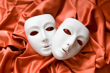 Theatre concept with the white plastic masks