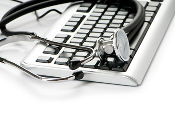 Stethoscope and keyboard illustrating concept of digital securit