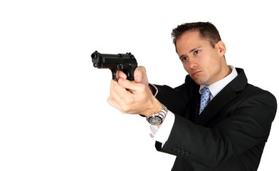A Secret Agent taking aim with his pistol
