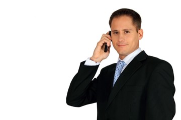 Young handsome business man making a smartphone call