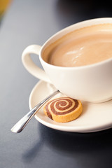 Cup of coffee with sweet cake