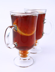 Two glasses of tea with lemon