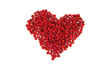 Fototapeta na wymiar Red Love Beans Arranged In A Heart Shape
