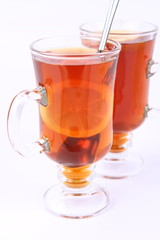 Two glasses of tea with lemon