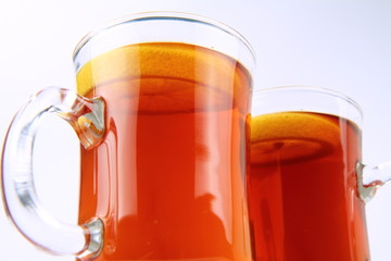Two glasses of tea with lemon