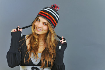 portrait of beautiful young girl in winter day