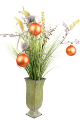 Bunch with artificial grass with christmas decoration.