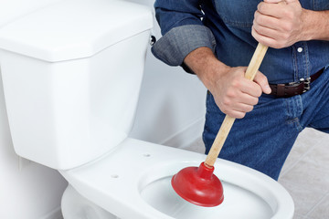 Plumber with a plunger - obrazy, fototapety, plakaty
