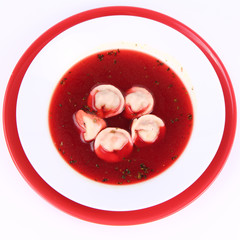 Polish Christmas Eve dish: clear borscht with uszka (dumplings)