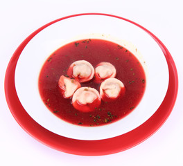 Polish Christmas Eve dish:clear borscht with dumplings (uszka)