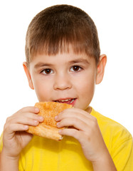 Boy eating pizza