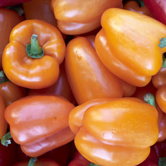 fresh orange peppers closeup